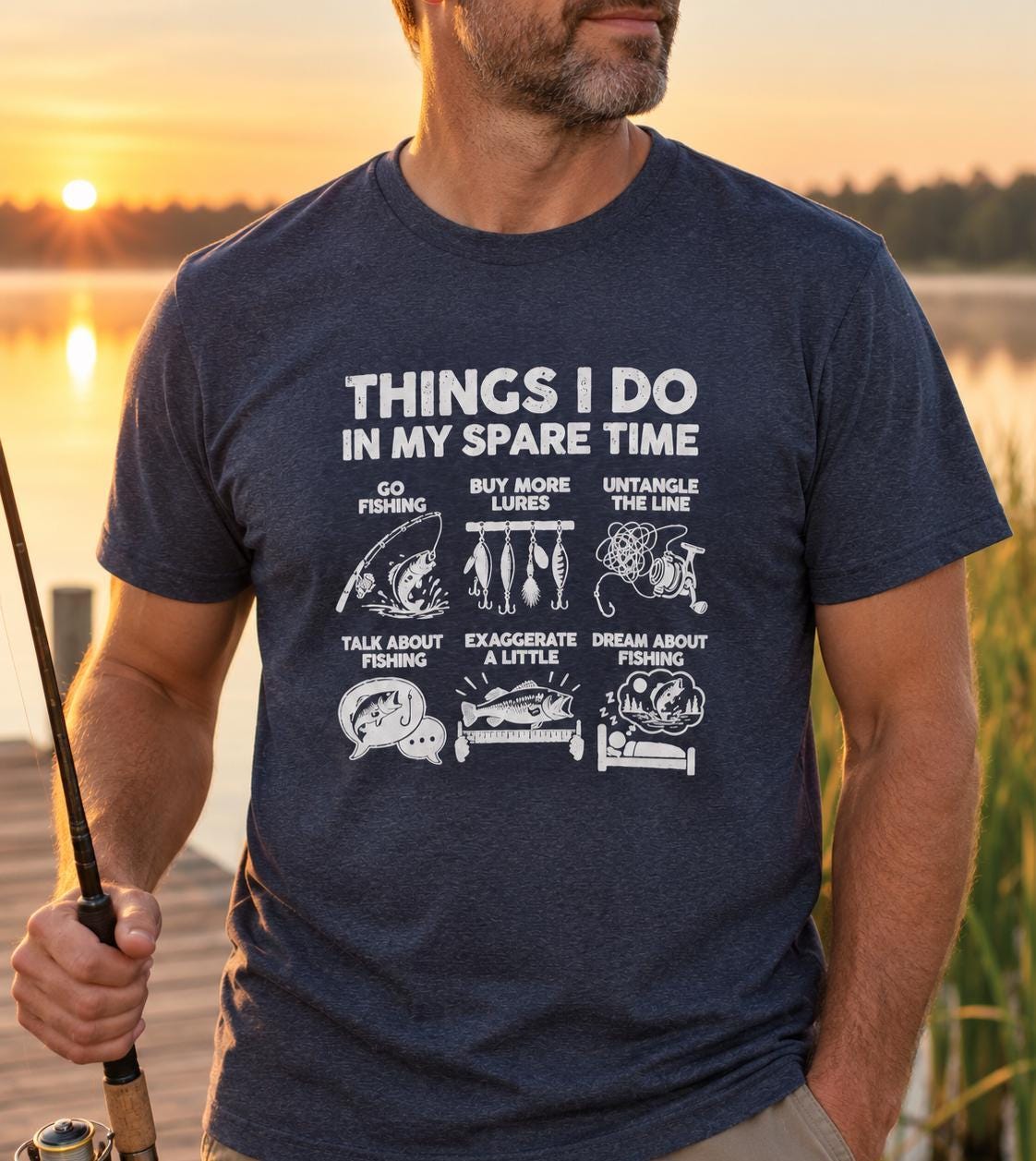 Things I Do In My Spare Time Fishing T-Shirt - man wearing the heather navy t-shirt on a dock at sunrise