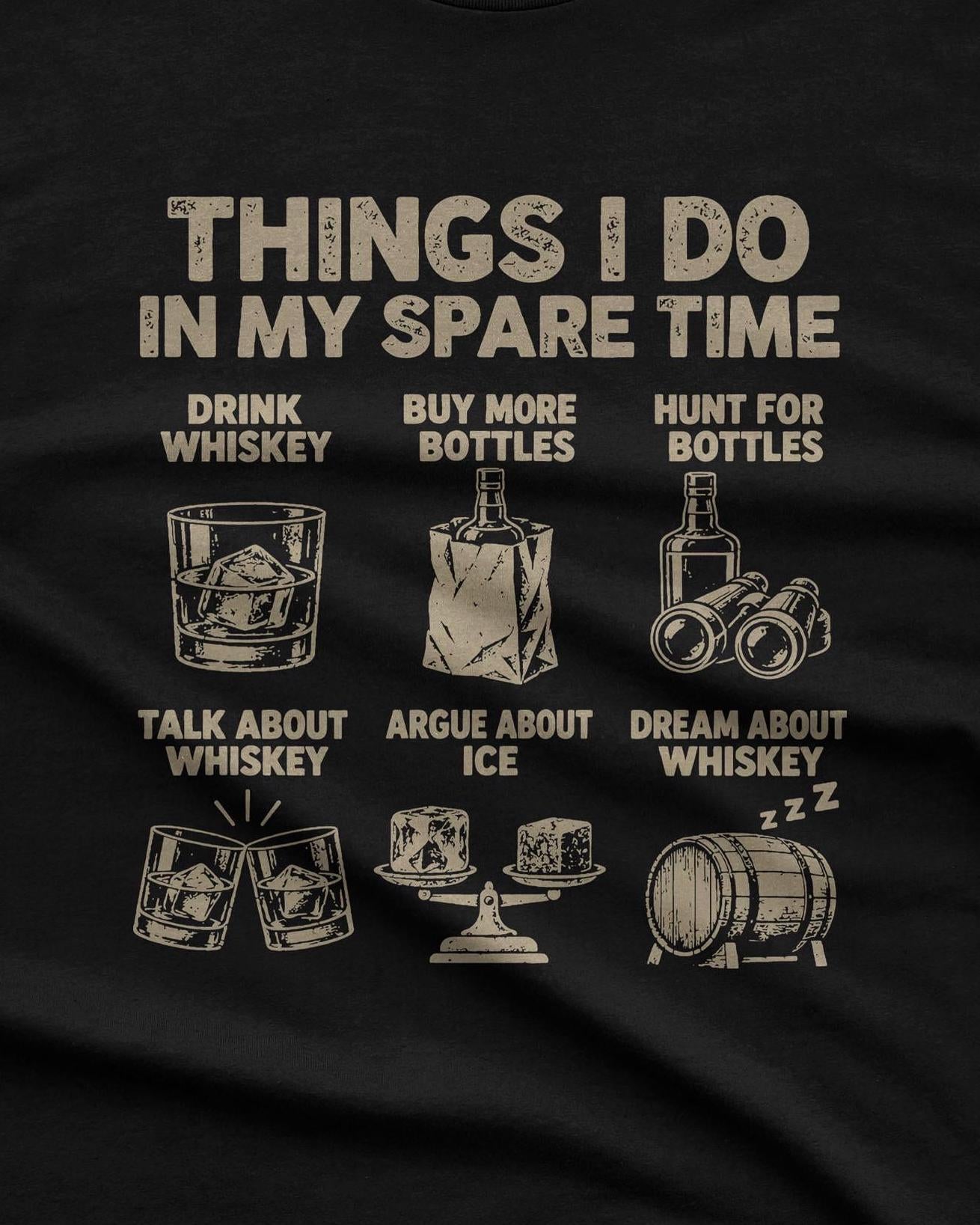Things I Do In My Spare Time Whiskey T-Shirt - black t-shirt folded on a bar next to a decanter and a glass of whiskey