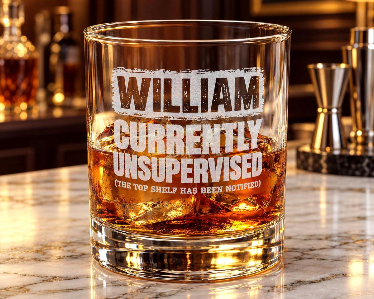 Currently Unsupervised Personalized Whiskey Glass - bar counter with ice and whiskey