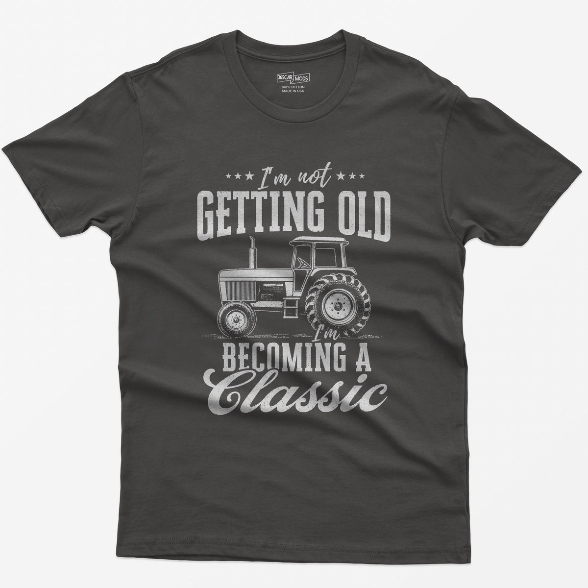 Dark Heather t-shirt with I'm Not Getting Old I'm Becoming a Classic in distressed white print around a vintage cab tractor