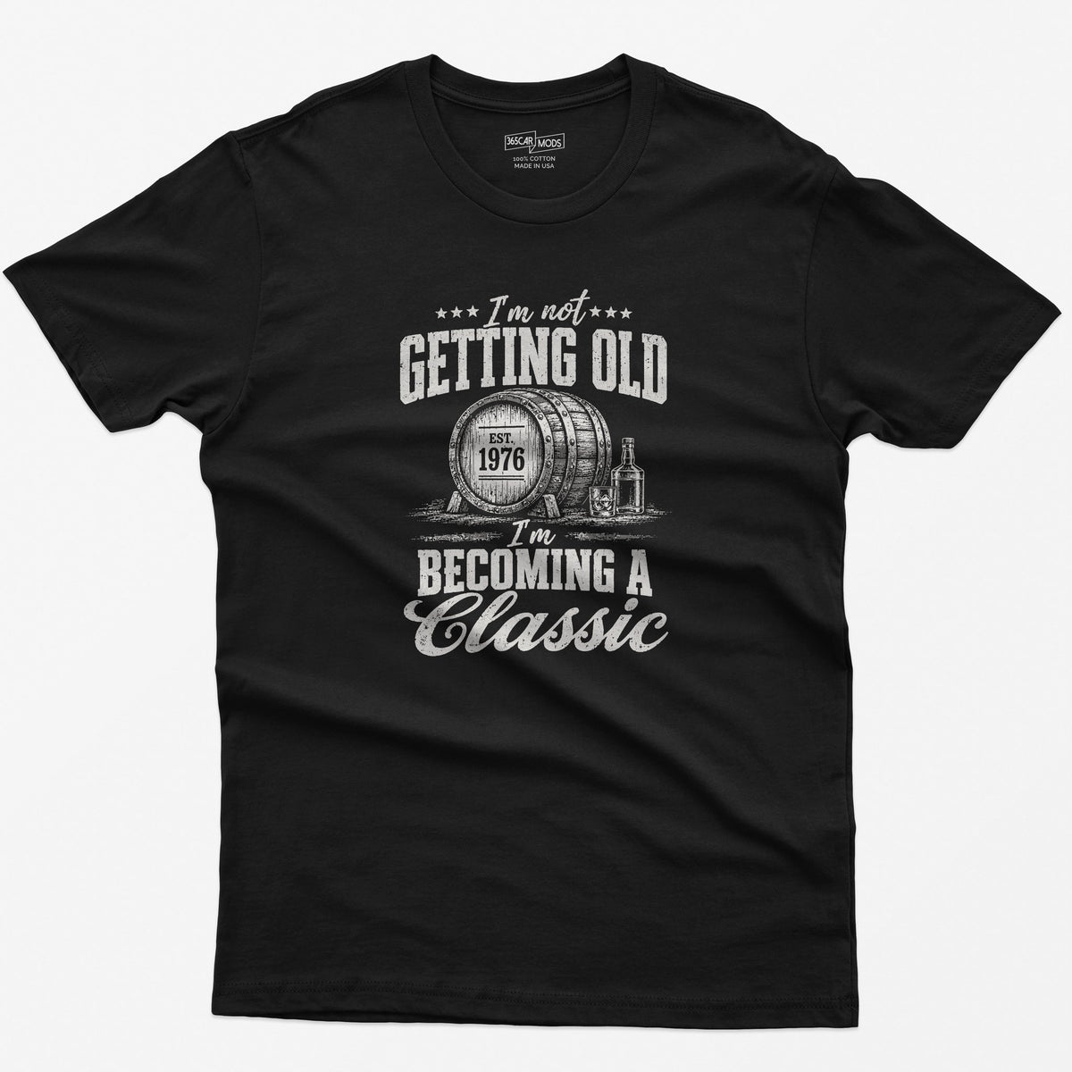 Black t-shirt with I'M NOT GETTING OLD, a vintage whiskey barrel stamped EST. 1976 and I'M BECOMING A Classic, in off-white print