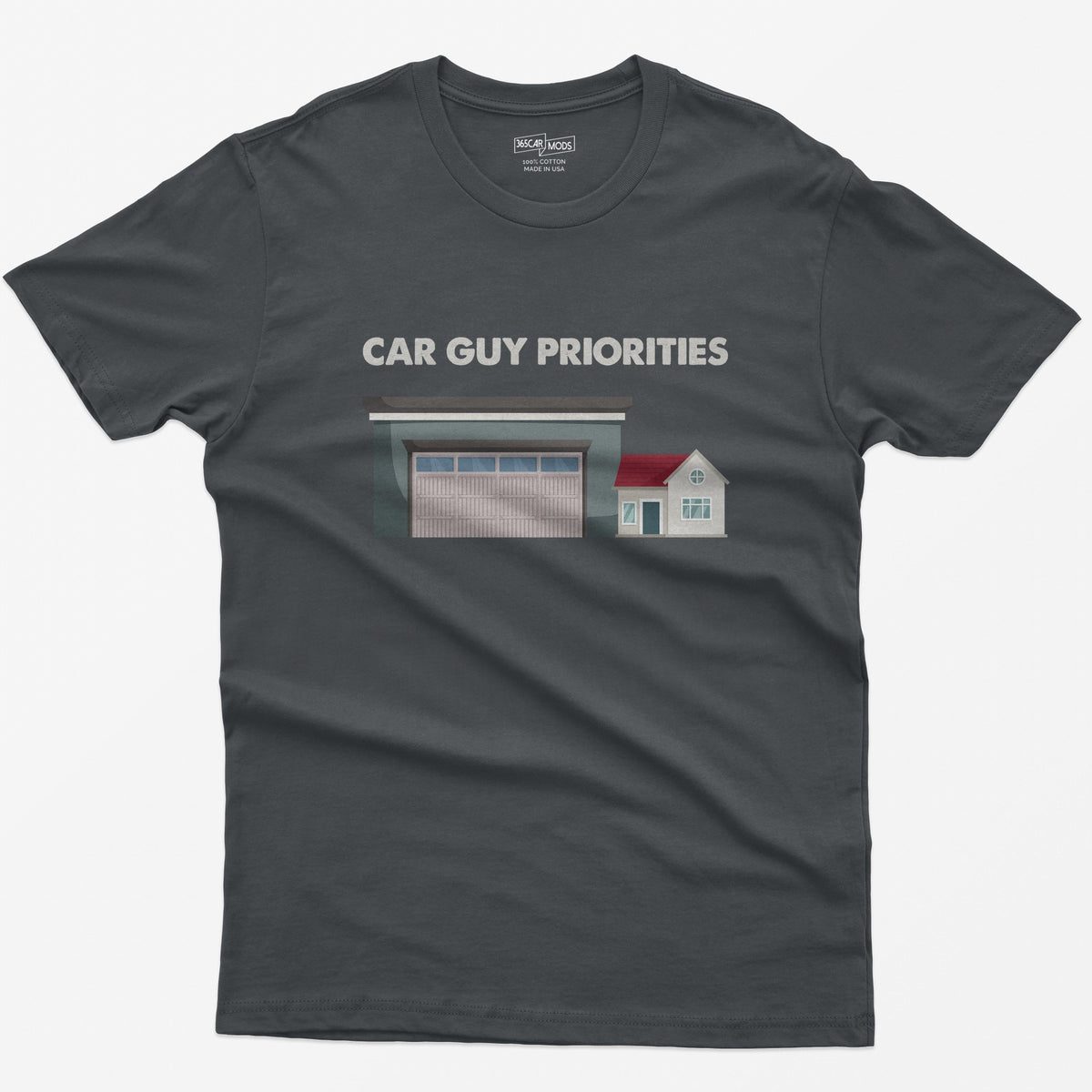 Charcoal t-shirt with Car Guy Priorities text above a huge garage next to a tiny house illustration