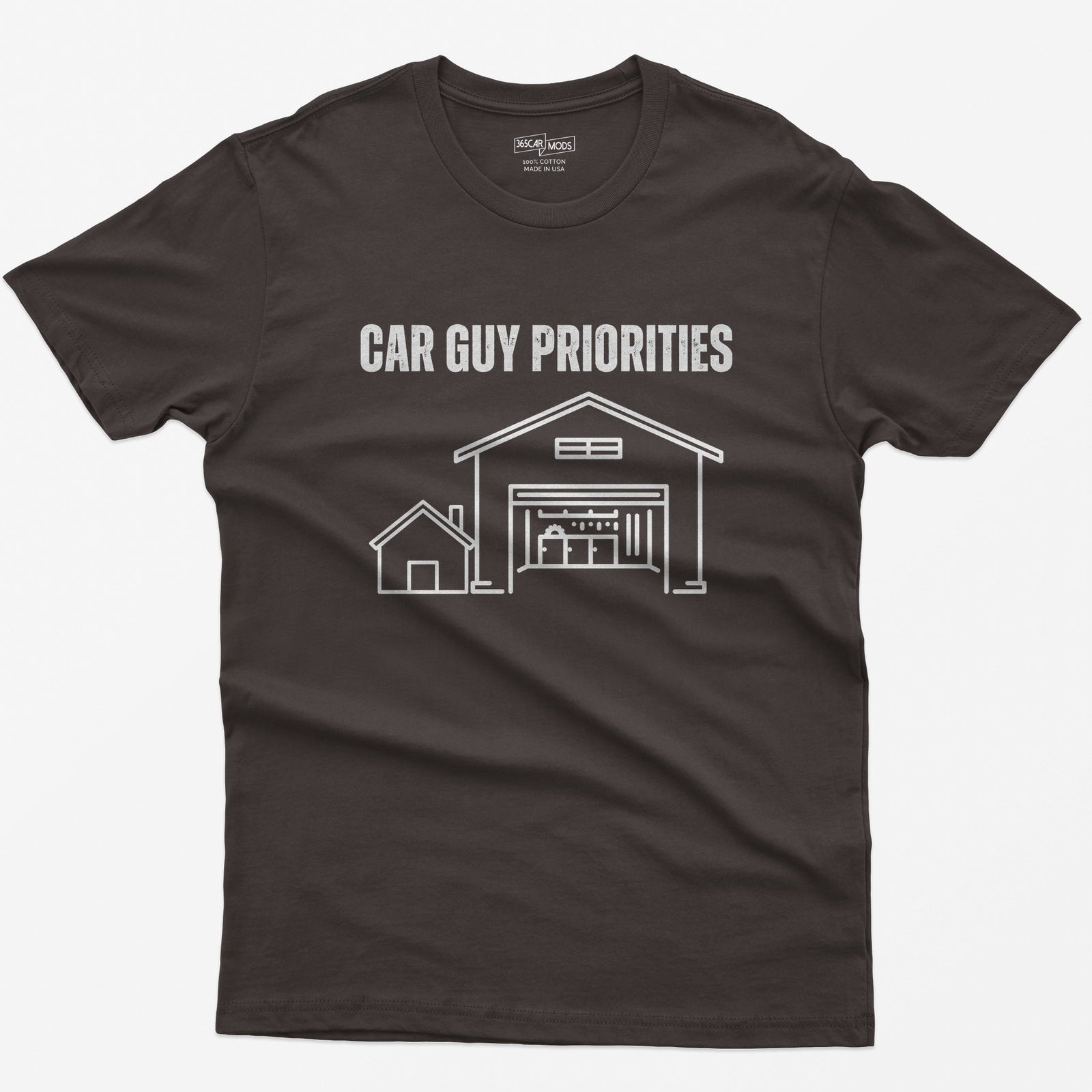Dark Chocolate t-shirt with Car Guy Priorities and a line drawing of a tiny house beside a huge garage with a car on a lift