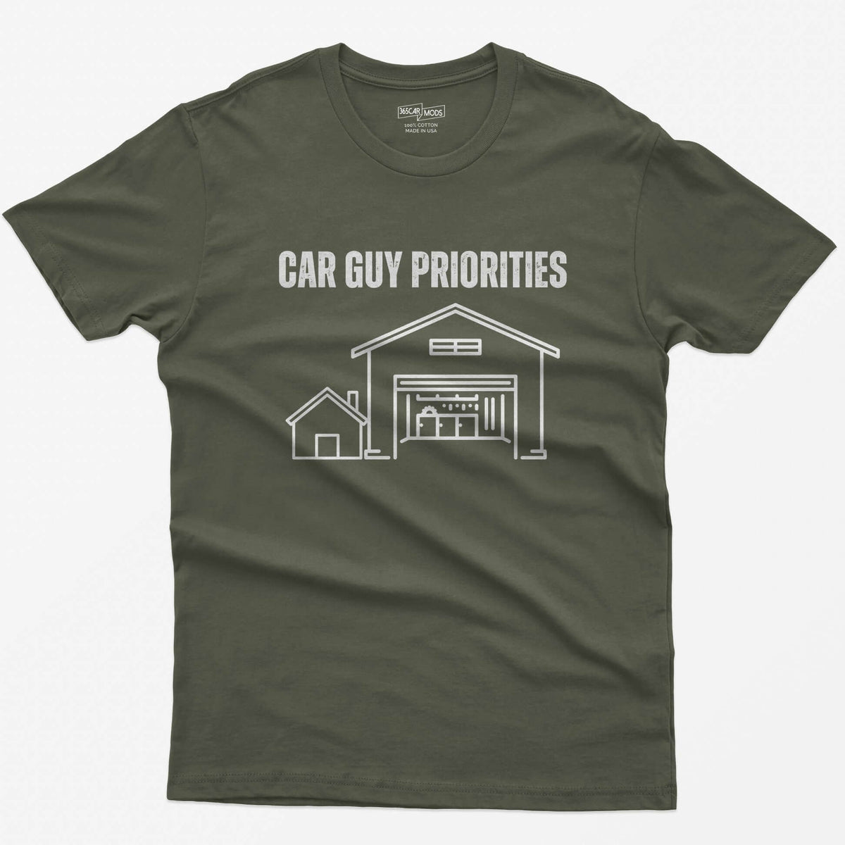 Military Green t-shirt with Car Guy Priorities and a line drawing of a tiny house beside a huge garage with a car on a lift