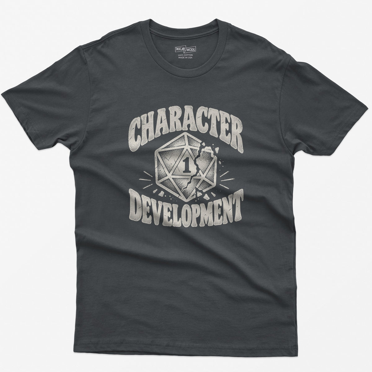 Character Development T-Shirt | Nat 1 D20 Tabletop RPG Tee in charcoal with a cracked d20 die design.