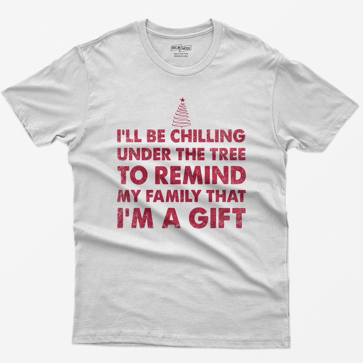 White t-shirt with I'll Be Chilling Under the Tree to Remind My Family That I'm a Gift in white letters and a small tree