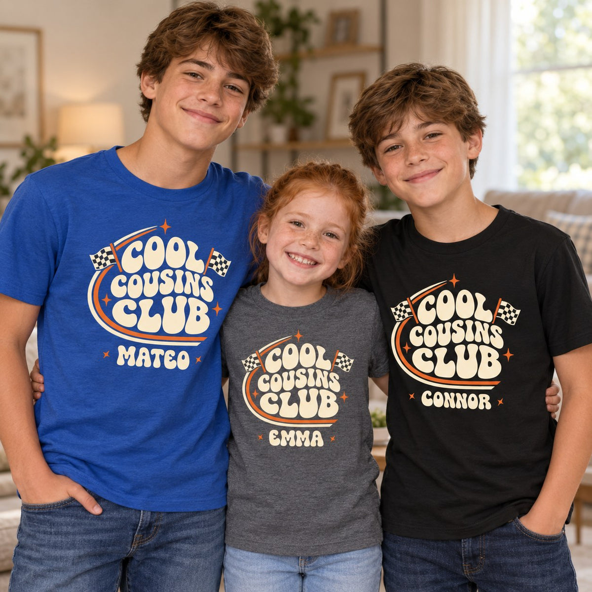 Three cousins in royal blue, grey and black personalized Cool Cousins Club t-shirts