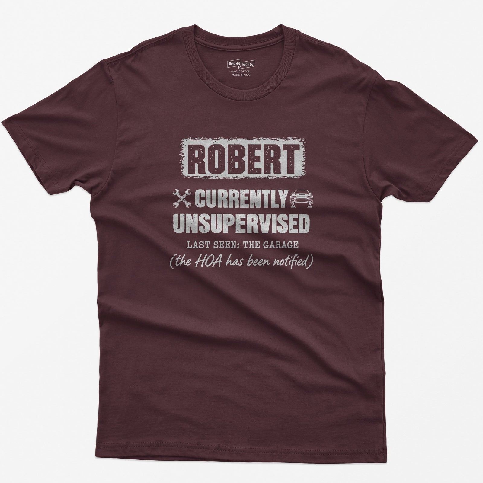 Maroon t-shirt with a personalized Currently Unsupervised print: his name in a box, Last Seen: The Garage