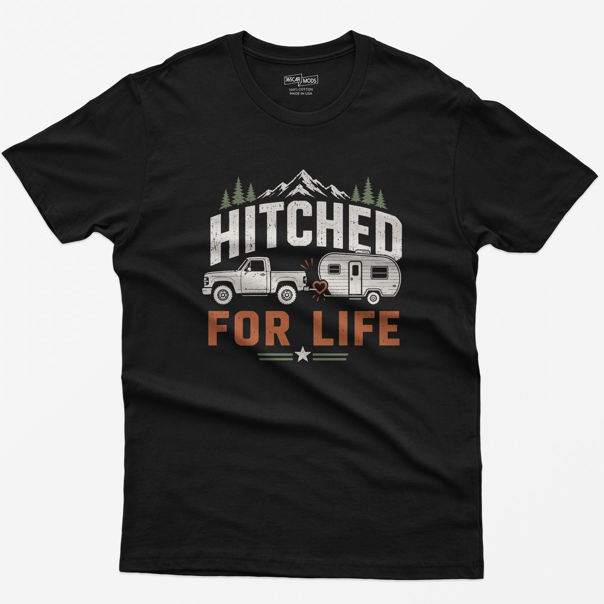 Black t-shirt with Hitched For Life, a pickup towing a travel trailer joined by a heart-shaped hitch, mountains and pines