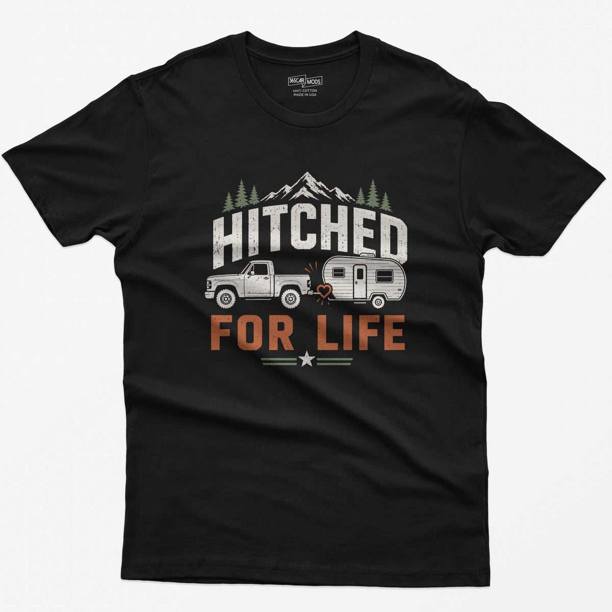 Black t-shirt with Hitched For Life, a pickup towing a travel trailer joined by a heart-shaped hitch, mountains and pines