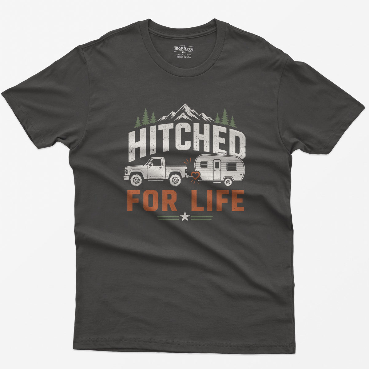 Dark Heather t-shirt with Hitched For Life, a pickup towing a travel trailer joined by a heart-shaped hitch, mountains and pines
