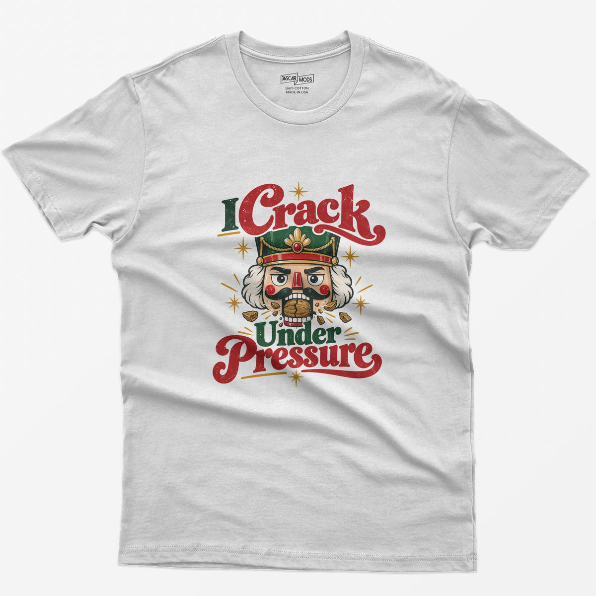 I Crack Under Pressure T-Shirt | Funny Nutcracker Christmas Tee on a white shirt with humorous design.