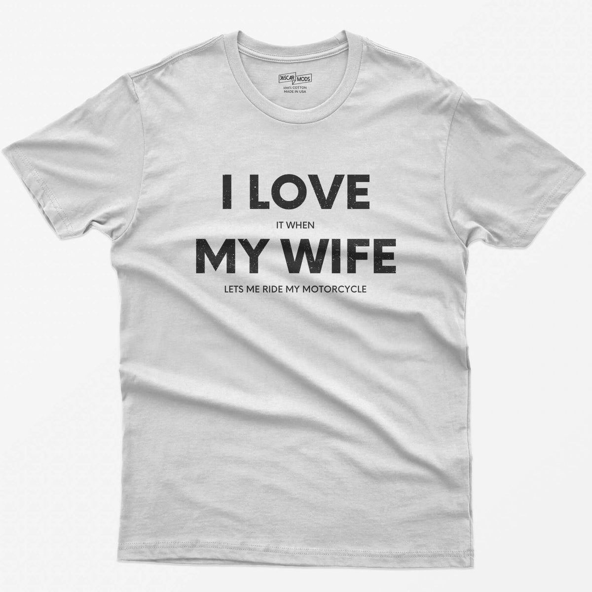 White t-shirt with I Love My Wife in big white letters and small print reading it when and lets me ride my motorcycle