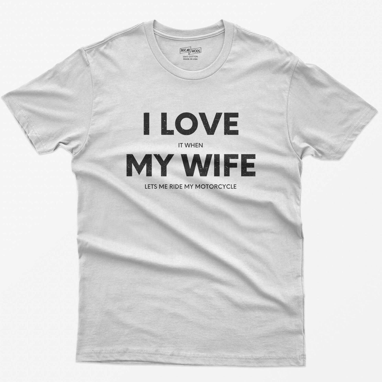 White t-shirt with I Love My Wife in big white letters and small print reading it when and lets me ride my motorcycle