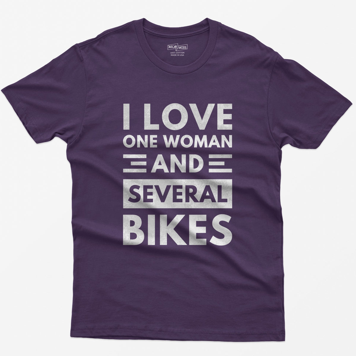 Purple t-shirt with distressed white block text reading I Love One Woman and Several Bikes