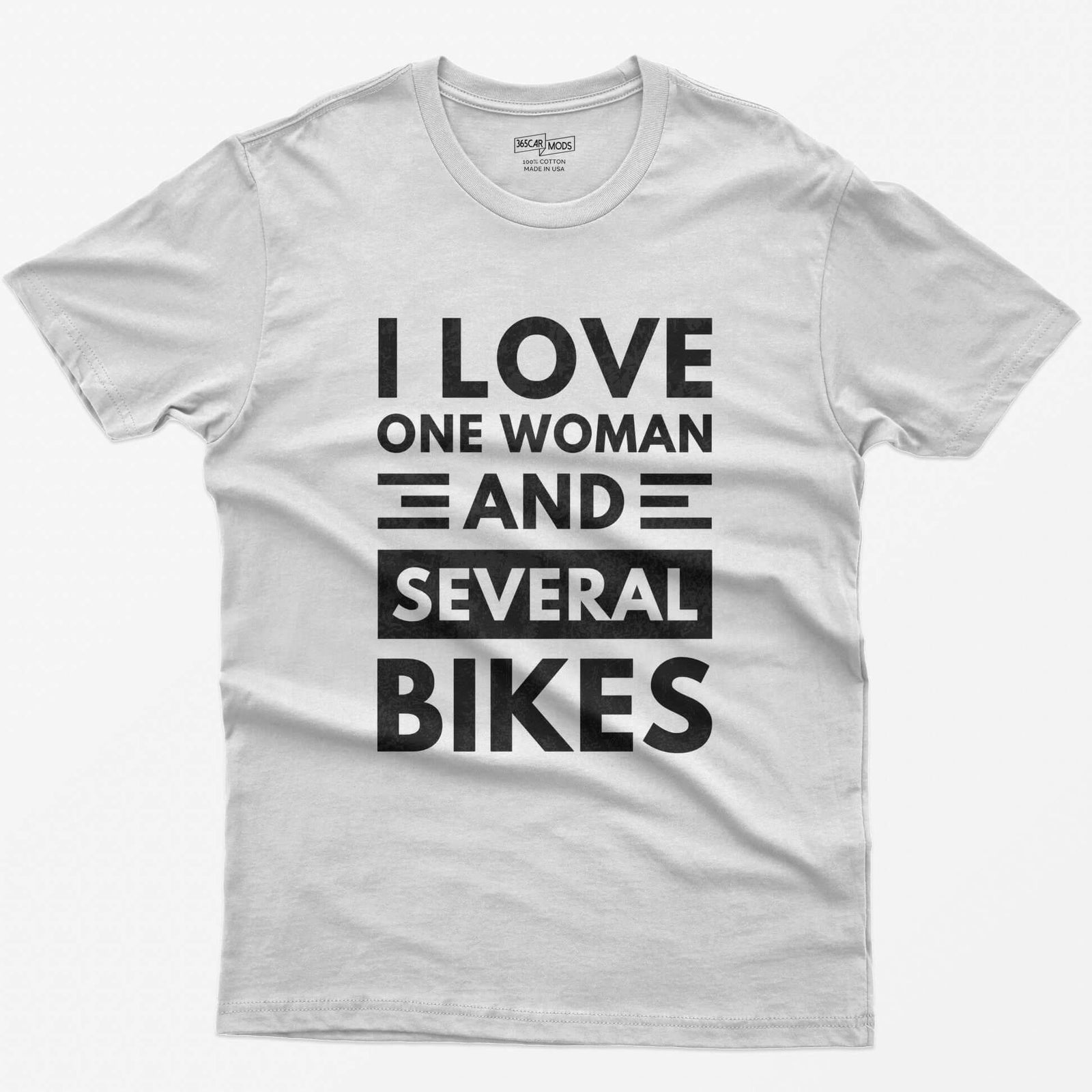 White t-shirt with distressed white block text reading I Love One Woman and Several Bikes