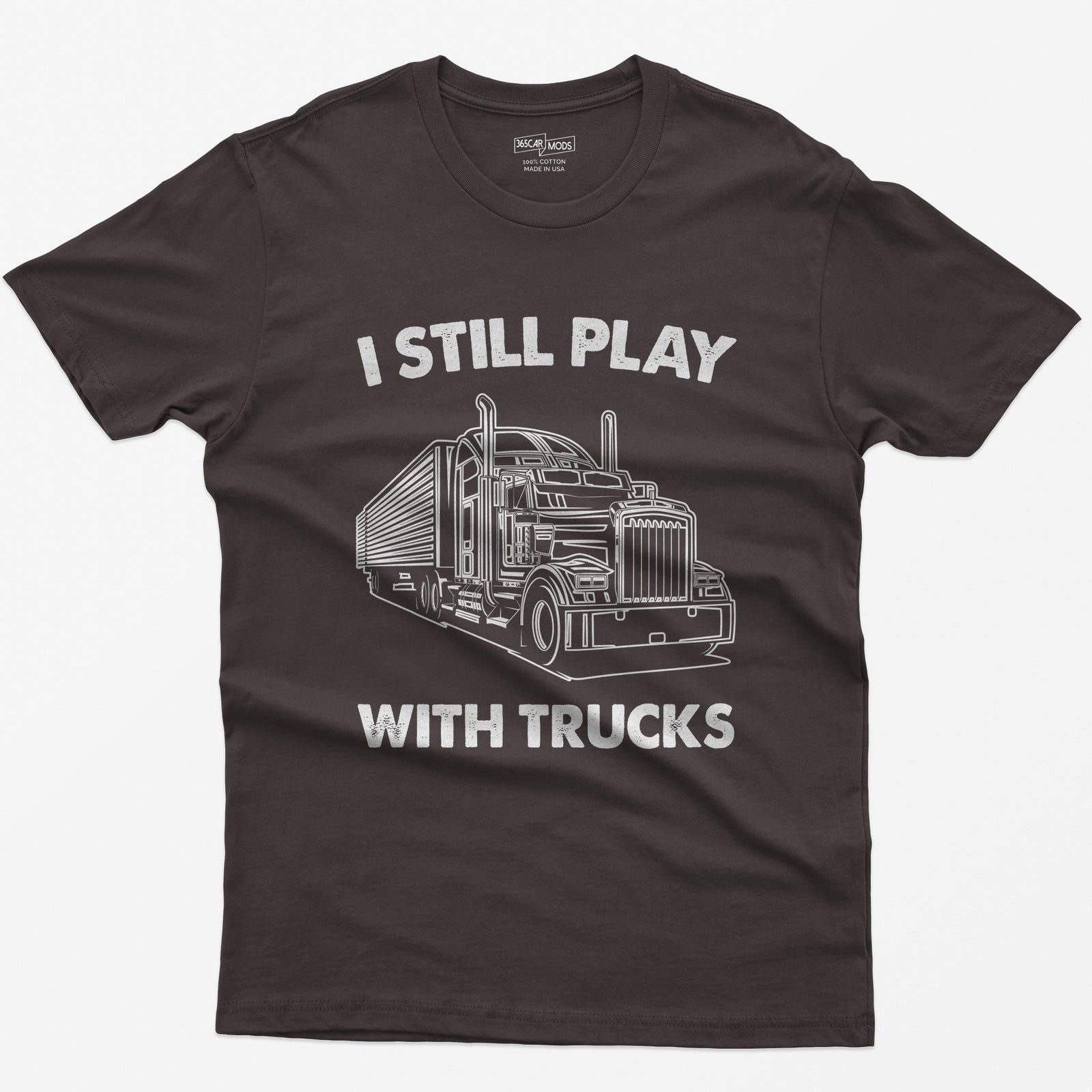 Dark Chocolate t-shirt with I Still Play With Trucks text and a white line drawing of a long-nose semi truck with trailer