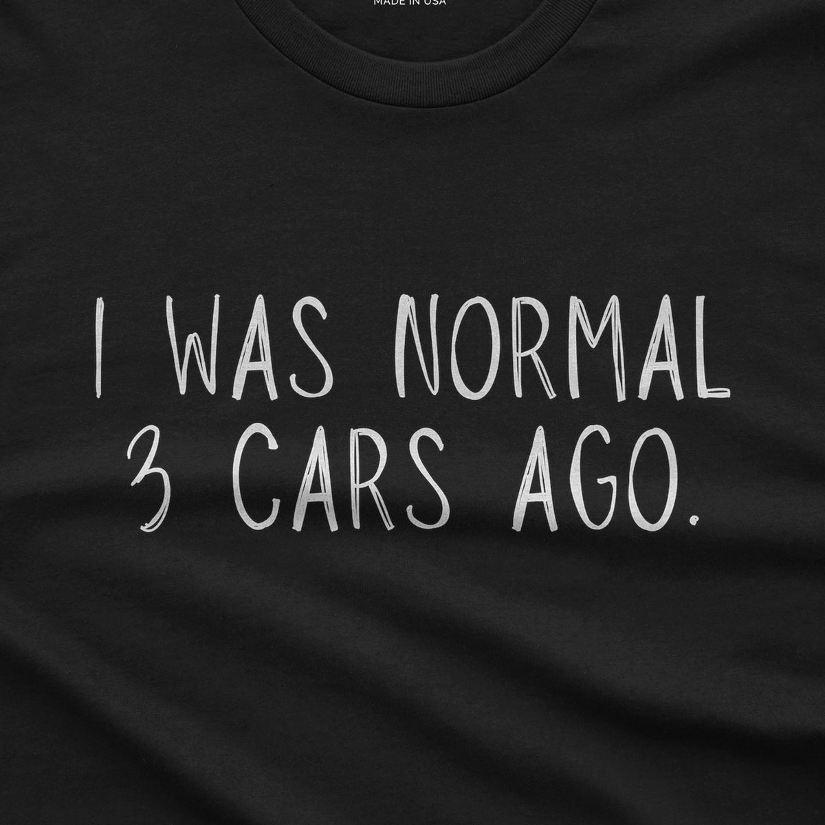 I Was Normal 3 Cars Ago T-Shirt design close-up