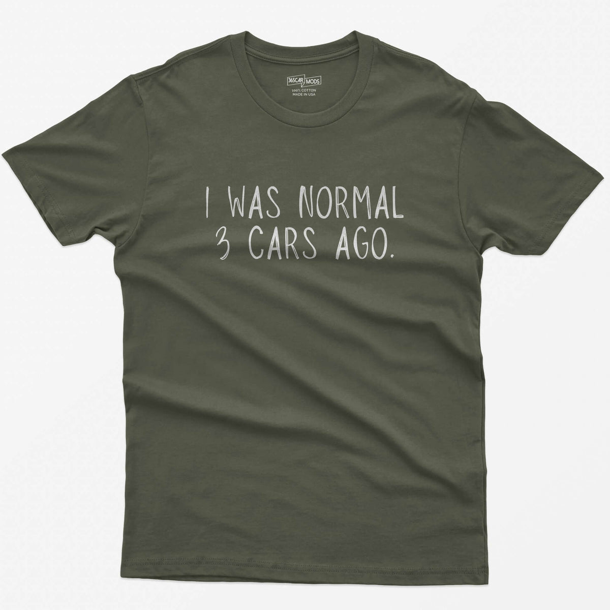 Military Green t-shirt with thin hand-lettered white text reading I Was Normal 3 Cars Ago