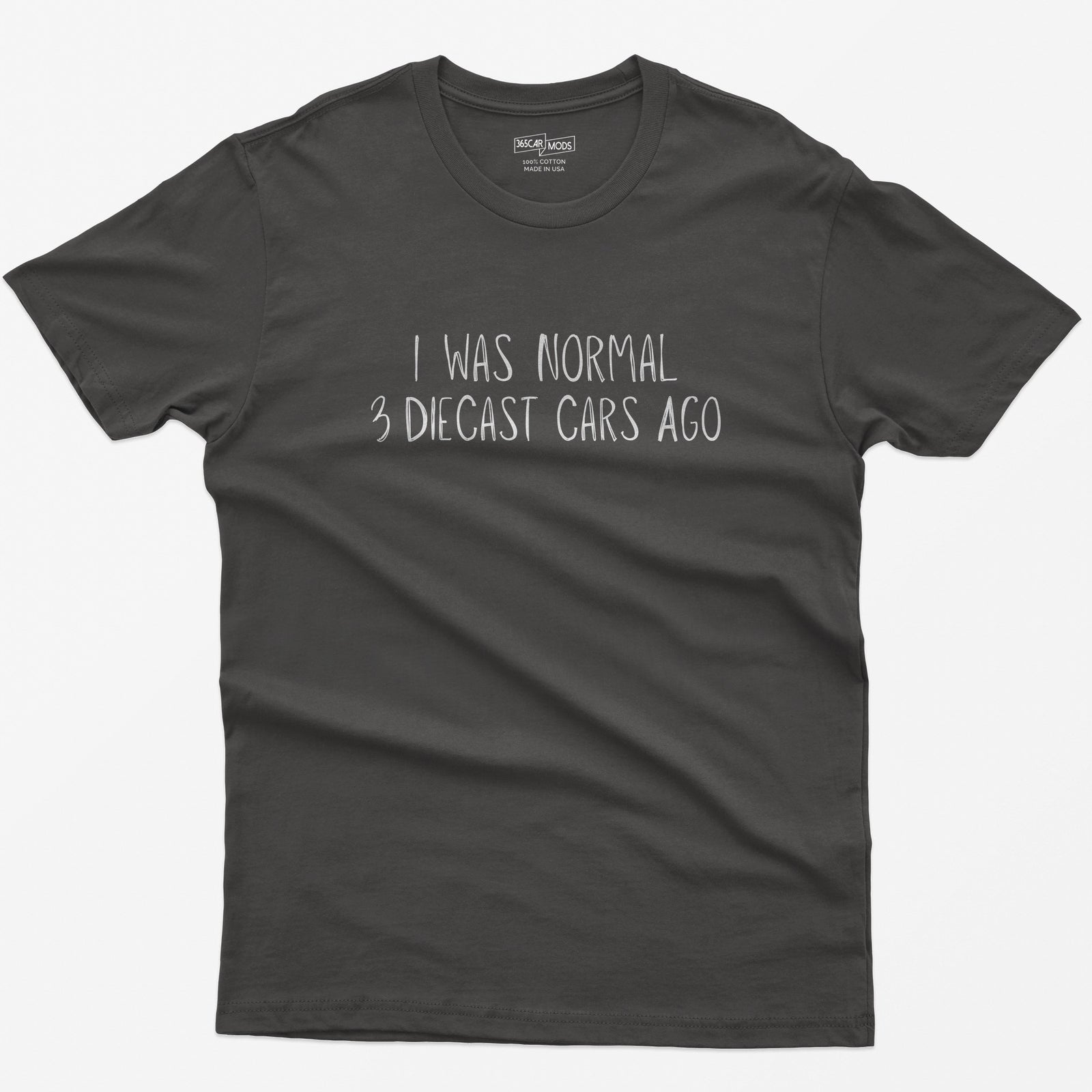 Dark Heather t-shirt with I Was Normal 3 Diecast Cars Ago in white handwritten lettering