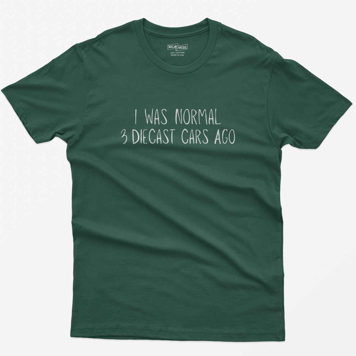 Forest Green t-shirt with I Was Normal 3 Diecast Cars Ago in white handwritten lettering