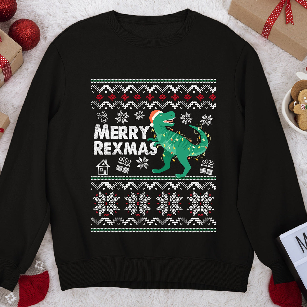 Dark sweatshirt with knit borders and a green T. rex in a Santa hat wrapped in lights, text Merry Rexmas