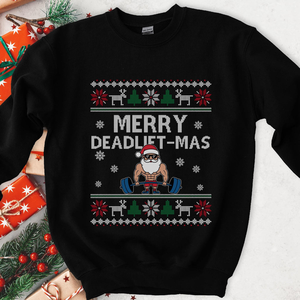 Dark sweatshirt with ugly sweater knit borders and a muscular Santa in sunglasses deadlifting, text Merry Deadlift-Mas