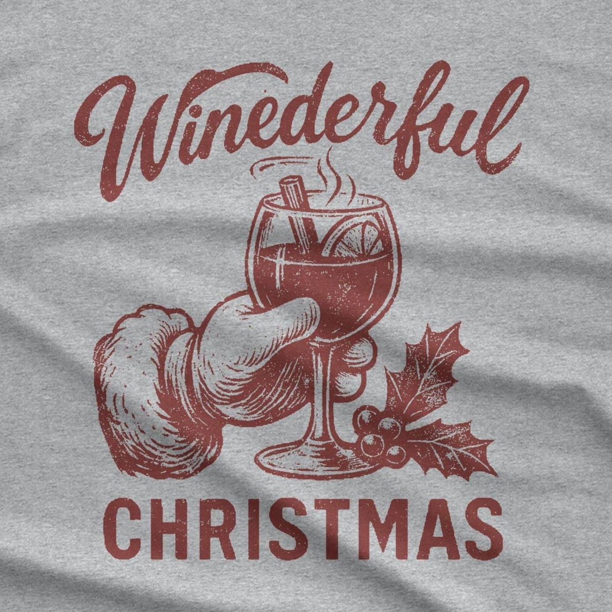 A red graphic on a gray background features the word "Winederful" above a drawing of a hand holding a wine glass filled with a warm beverage. The glass contains a cinnamon stick and orange slice.