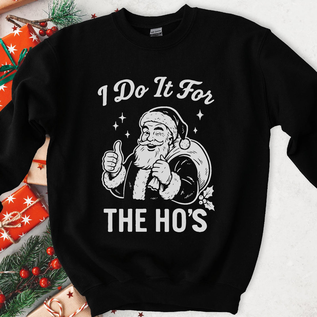 Black sweatshirt with an I Do It for the Ho's print: a grinning Santa with his gift sack giving a thumbs up