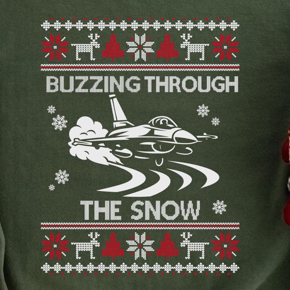 Buzzing Through the Snow Fighter Jet Christmas Sweatshirt design close-up