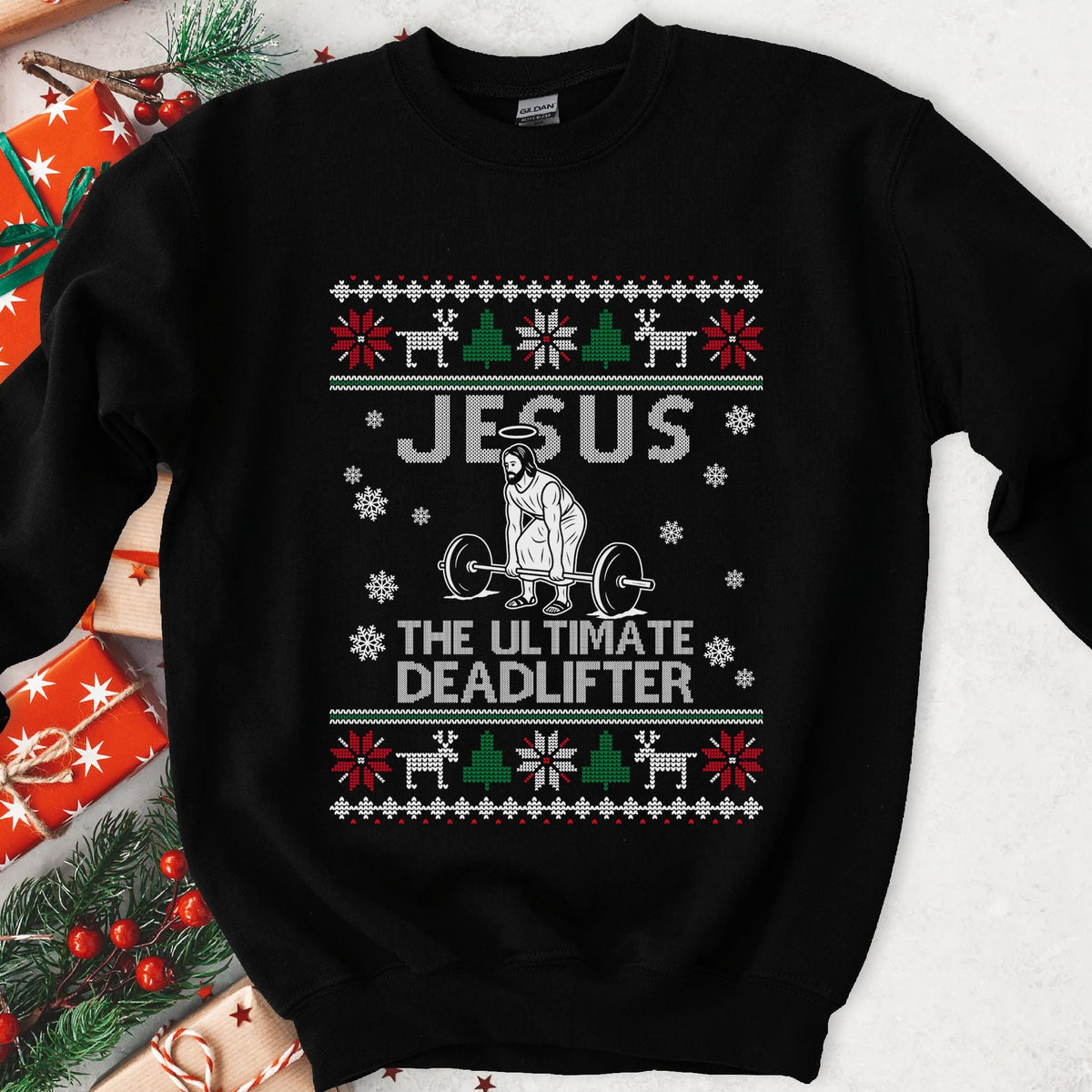 Dark sweatshirt with knit borders and Jesus in robe and sandals deadlifting, text Jesus The Ultimate Deadlifter