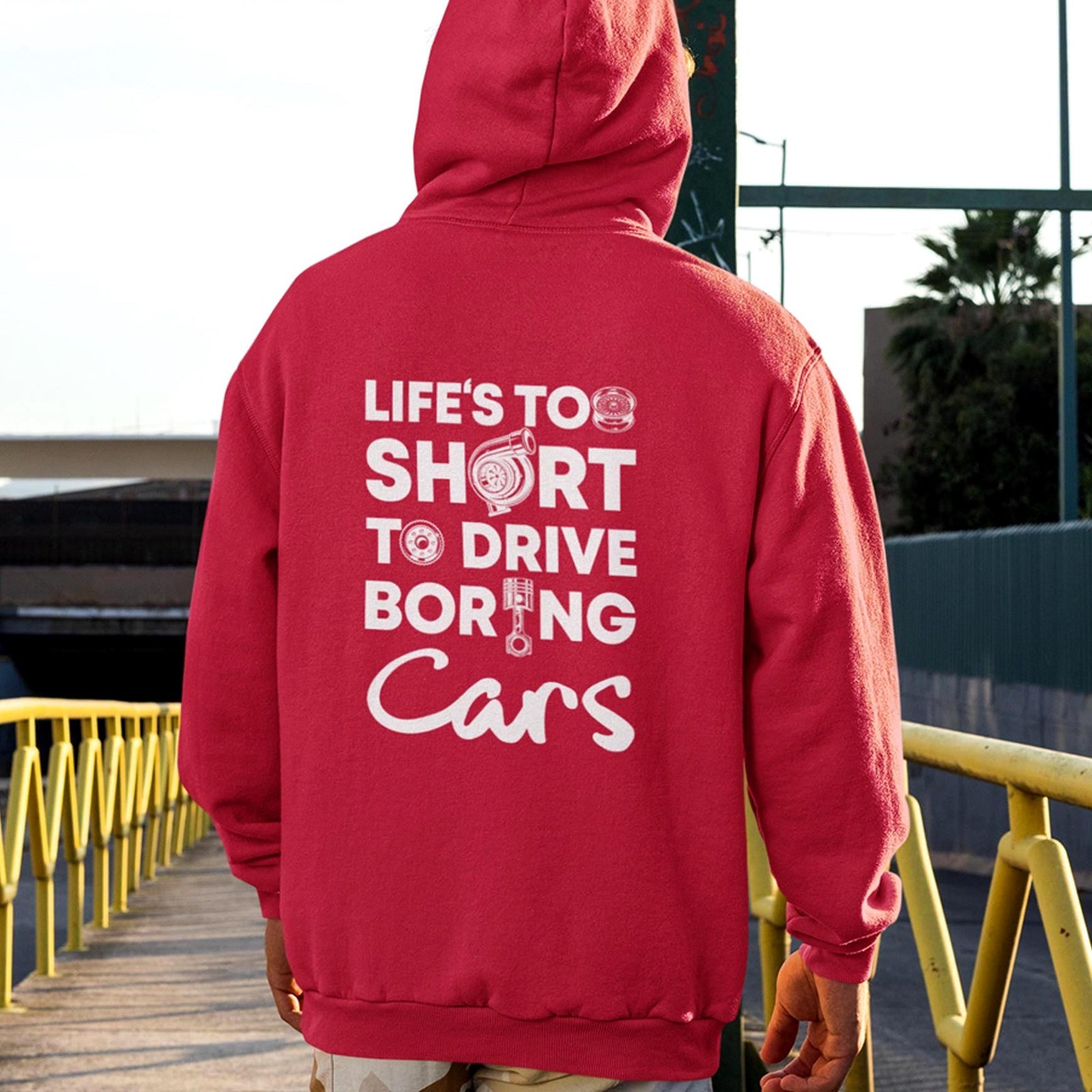 Life is Too Short to Drive Boring Cars hoodie - back print, lifestyle photo