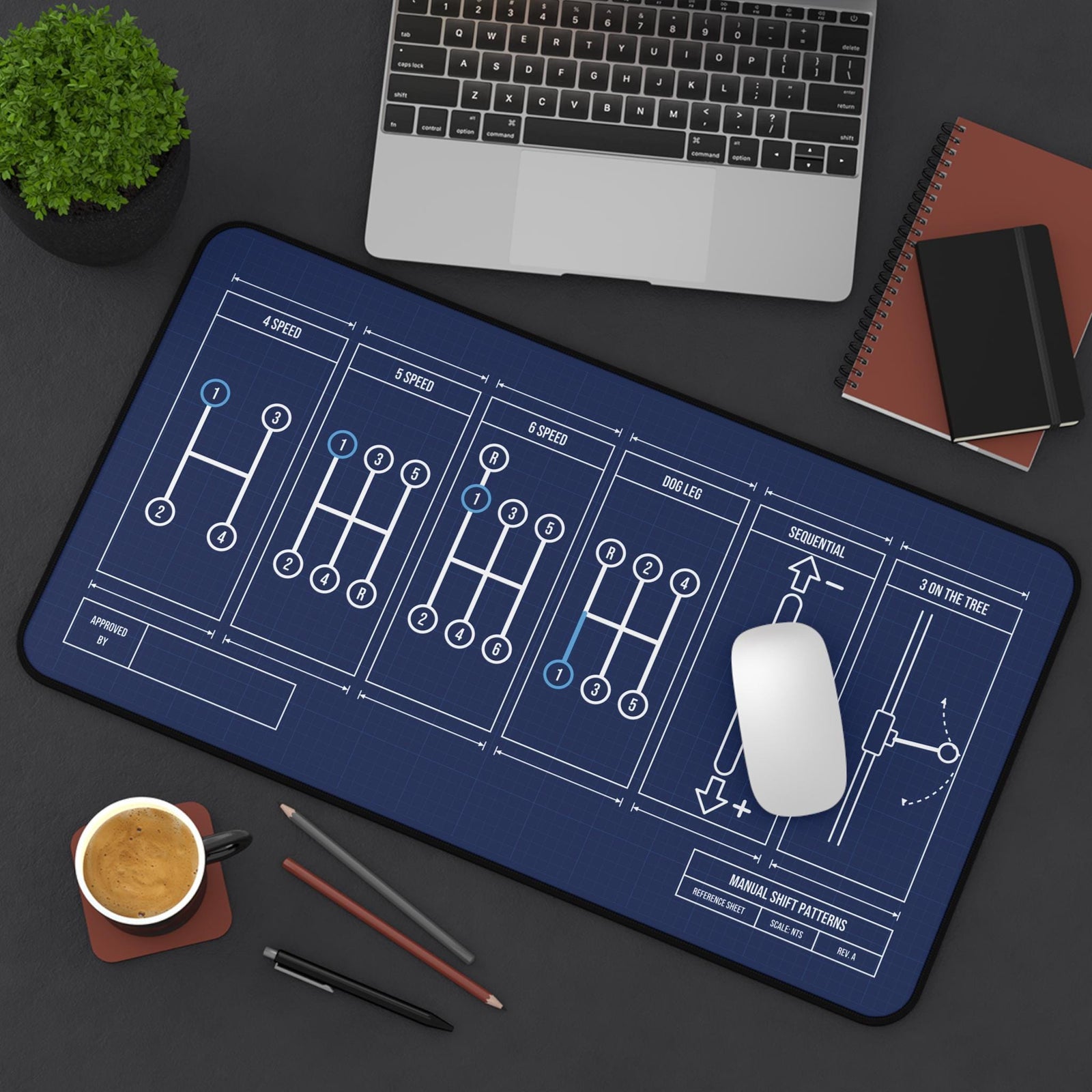 Manual shift patterns desk mat, angled top view with mouse