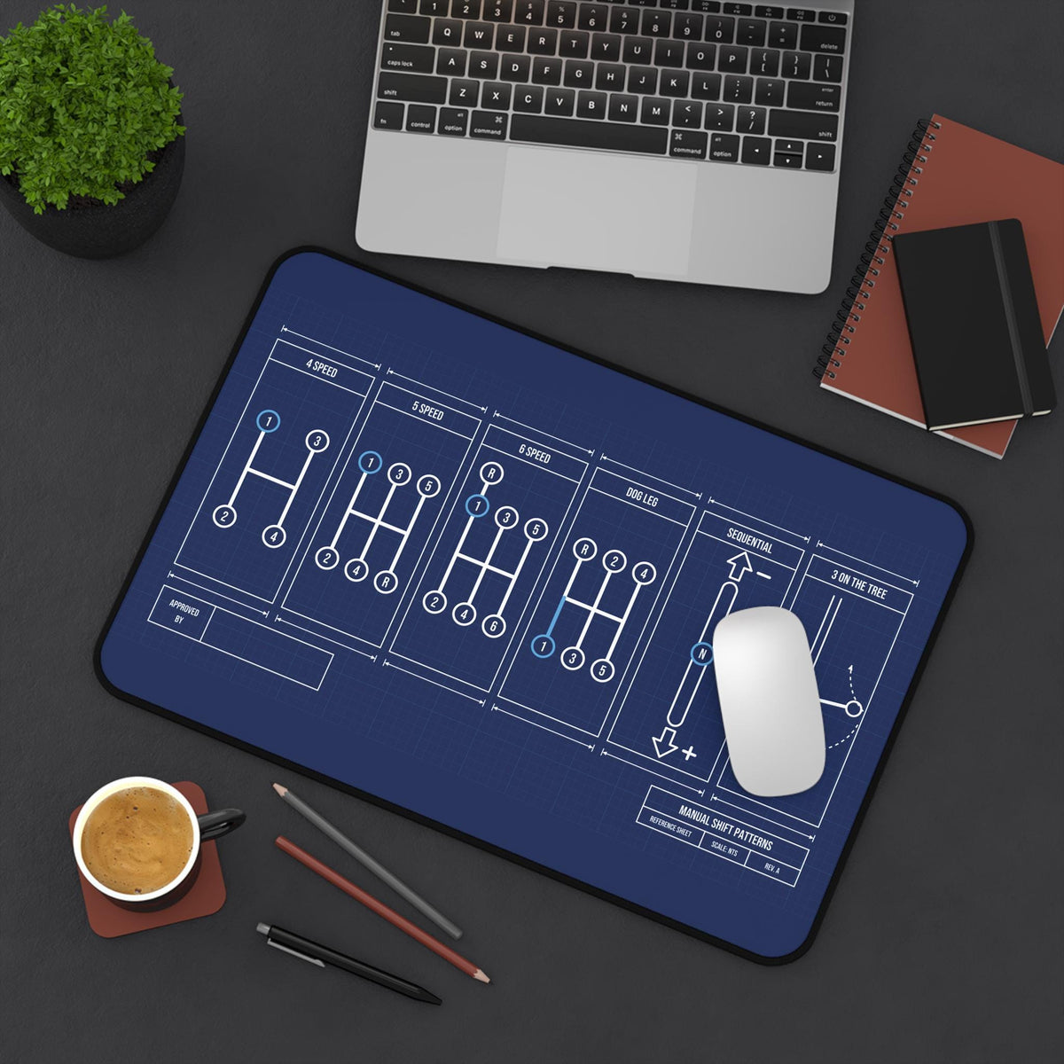 Manual shift patterns desk mat, small size, top view with mouse and coffee
