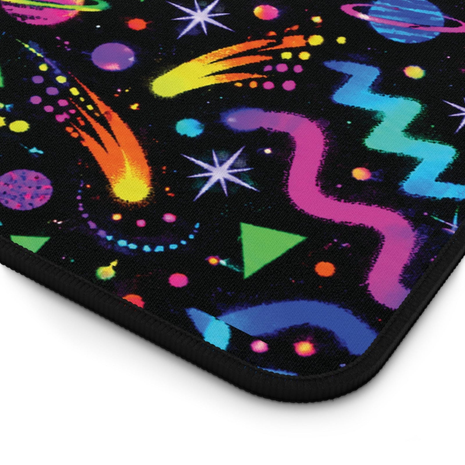 Close-up of the stitched edge on the arcade carpet desk mat