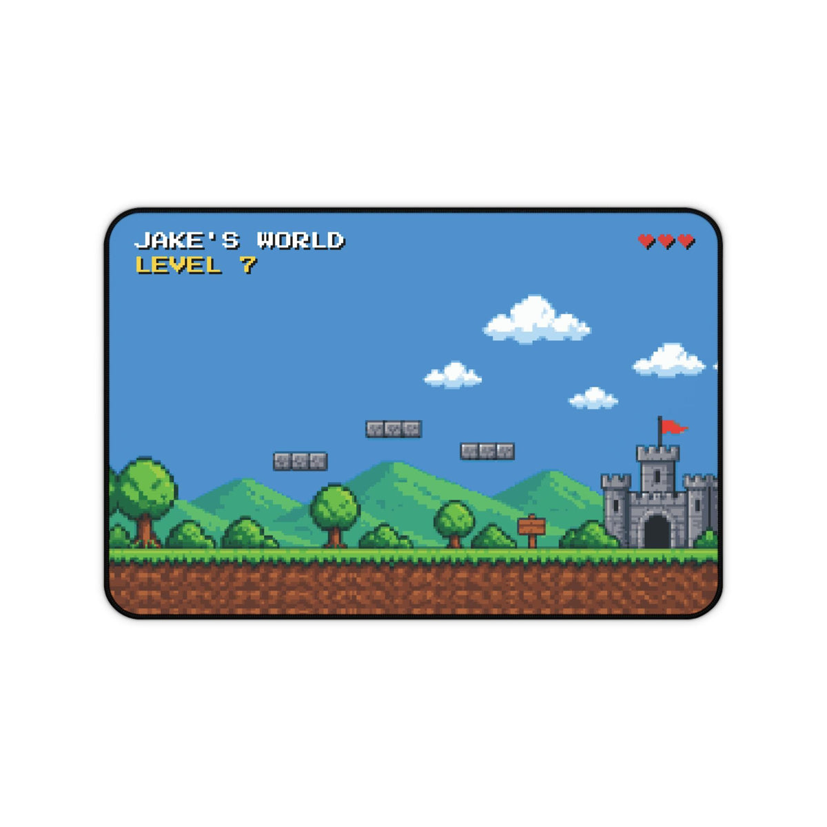 Personalized pixel art desk mat with a castle and red flag, top view