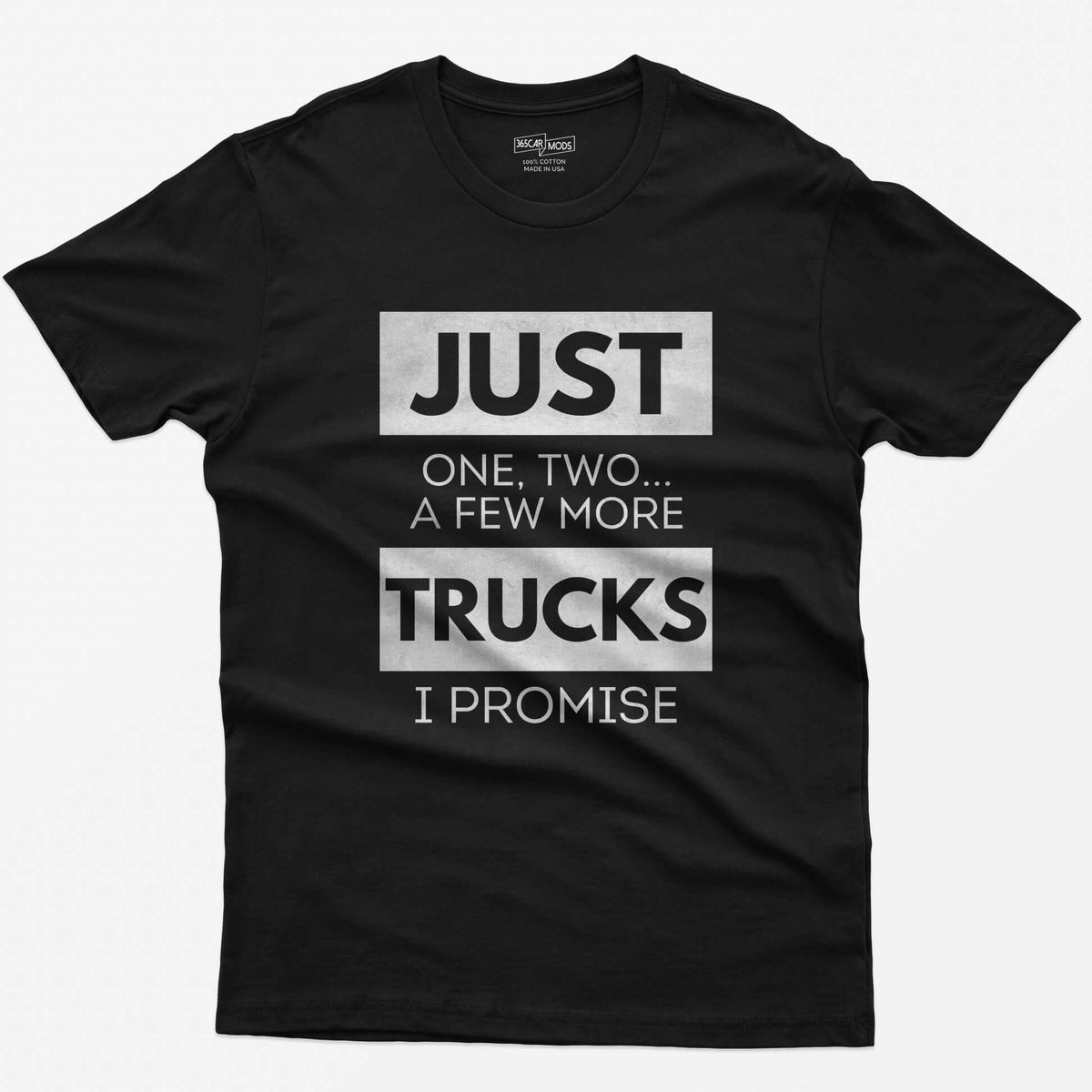Black t-shirt with Just One, Two, a Few More Trucks I Promise in bold stacked type on white blocks