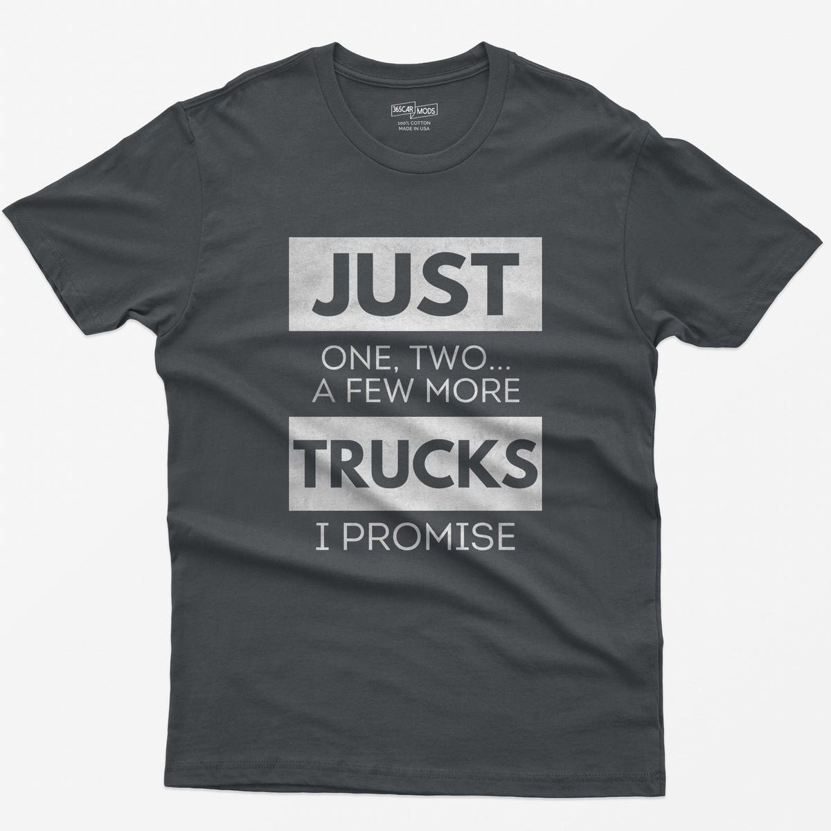 Charcoal t-shirt with Just One, Two, a Few More Trucks I Promise in bold stacked type on white blocks