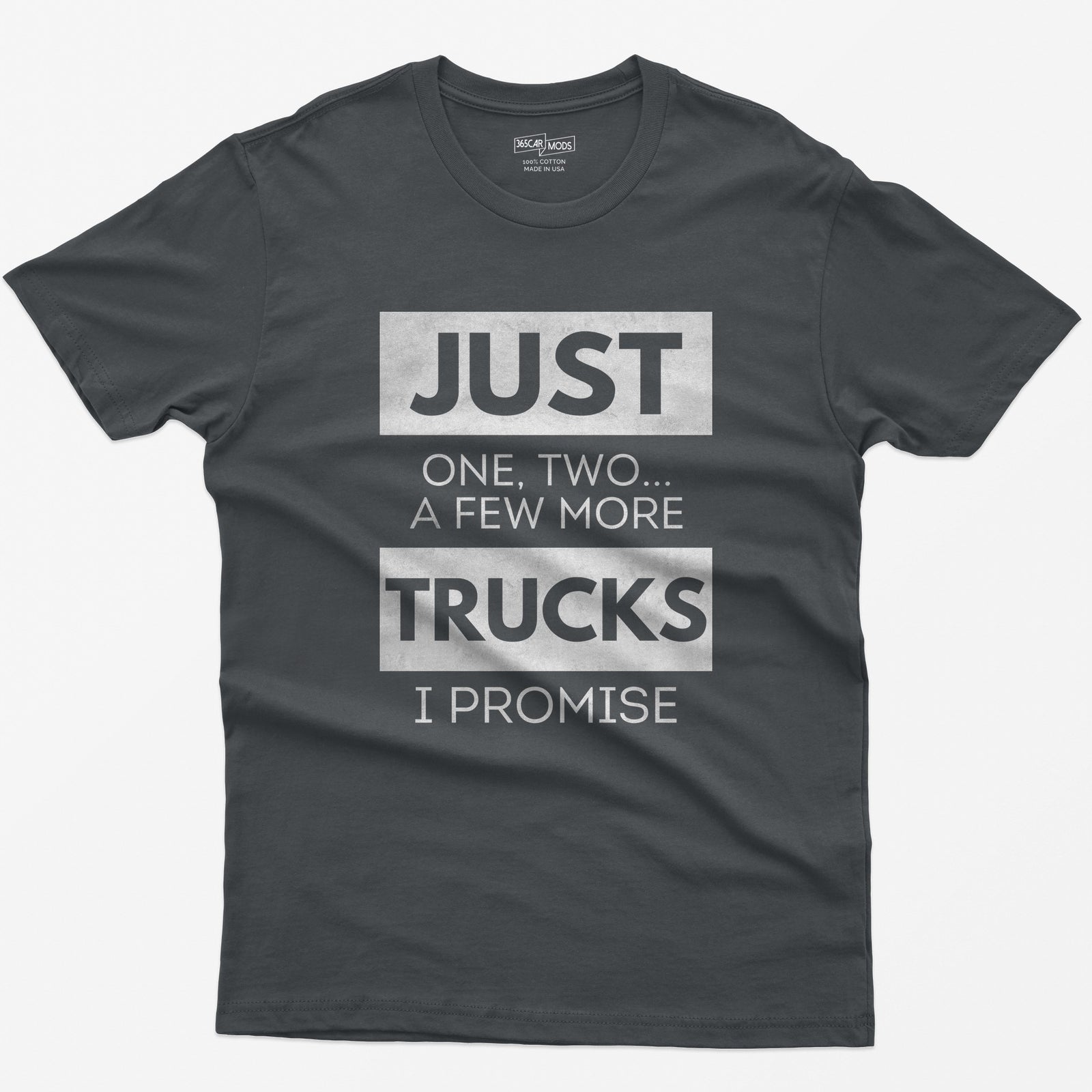 Charcoal t-shirt with Just One, Two, a Few More Trucks I Promise in bold stacked type on white blocks
