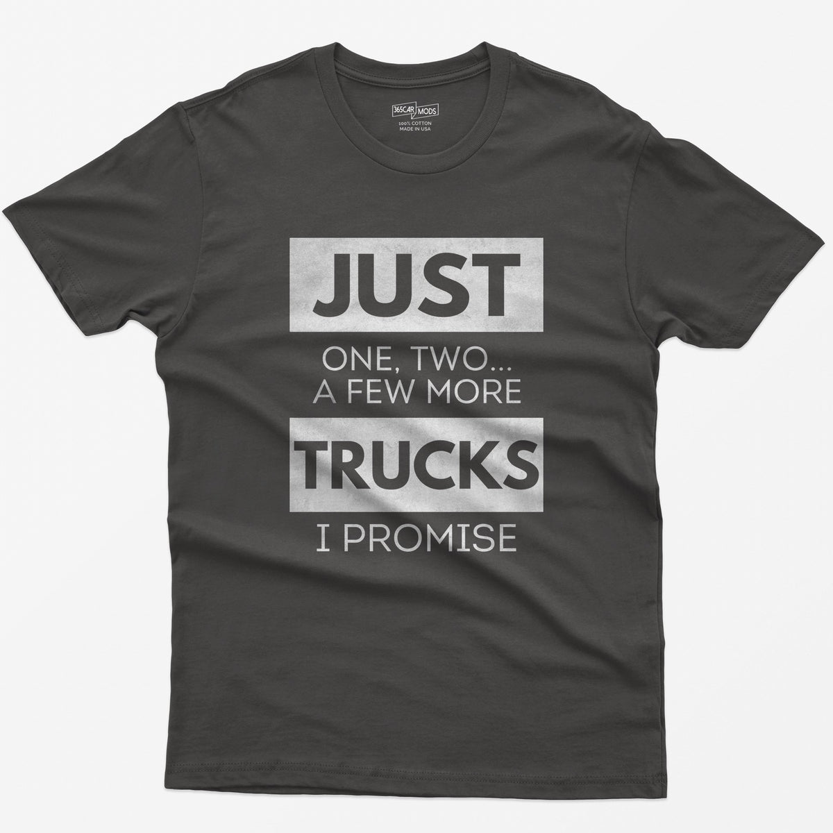 Dark Heather t-shirt with Just One, Two, a Few More Trucks I Promise in bold stacked type on white blocks