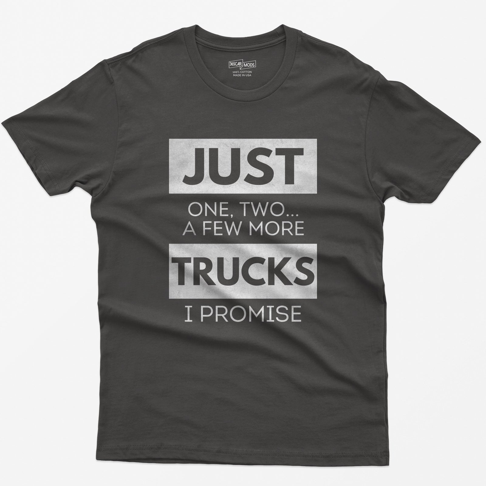 Dark Heather t-shirt with Just One, Two, a Few More Trucks I Promise in bold stacked type on white blocks