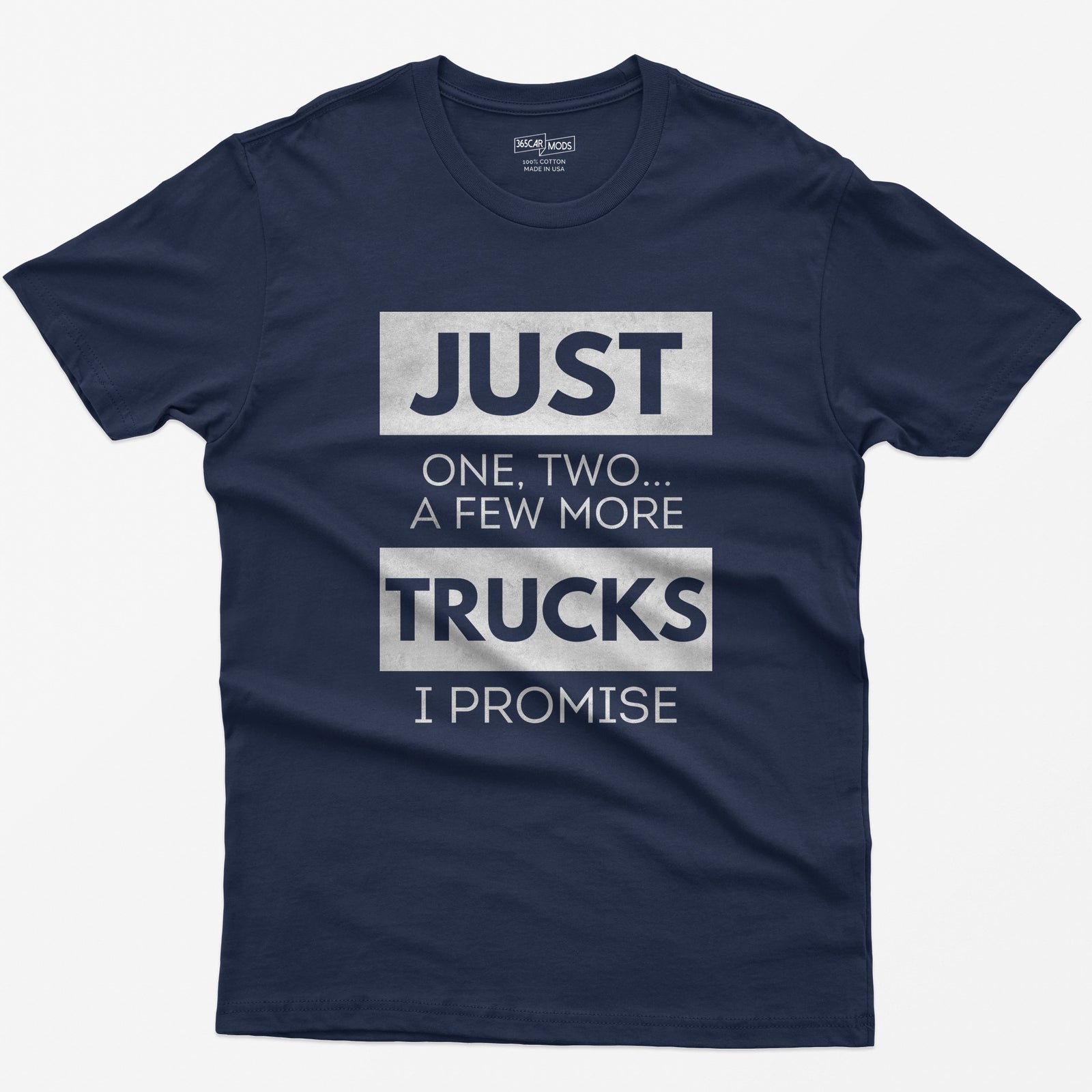 Navy t-shirt with Just One, Two, a Few More Trucks I Promise in bold stacked type on white blocks