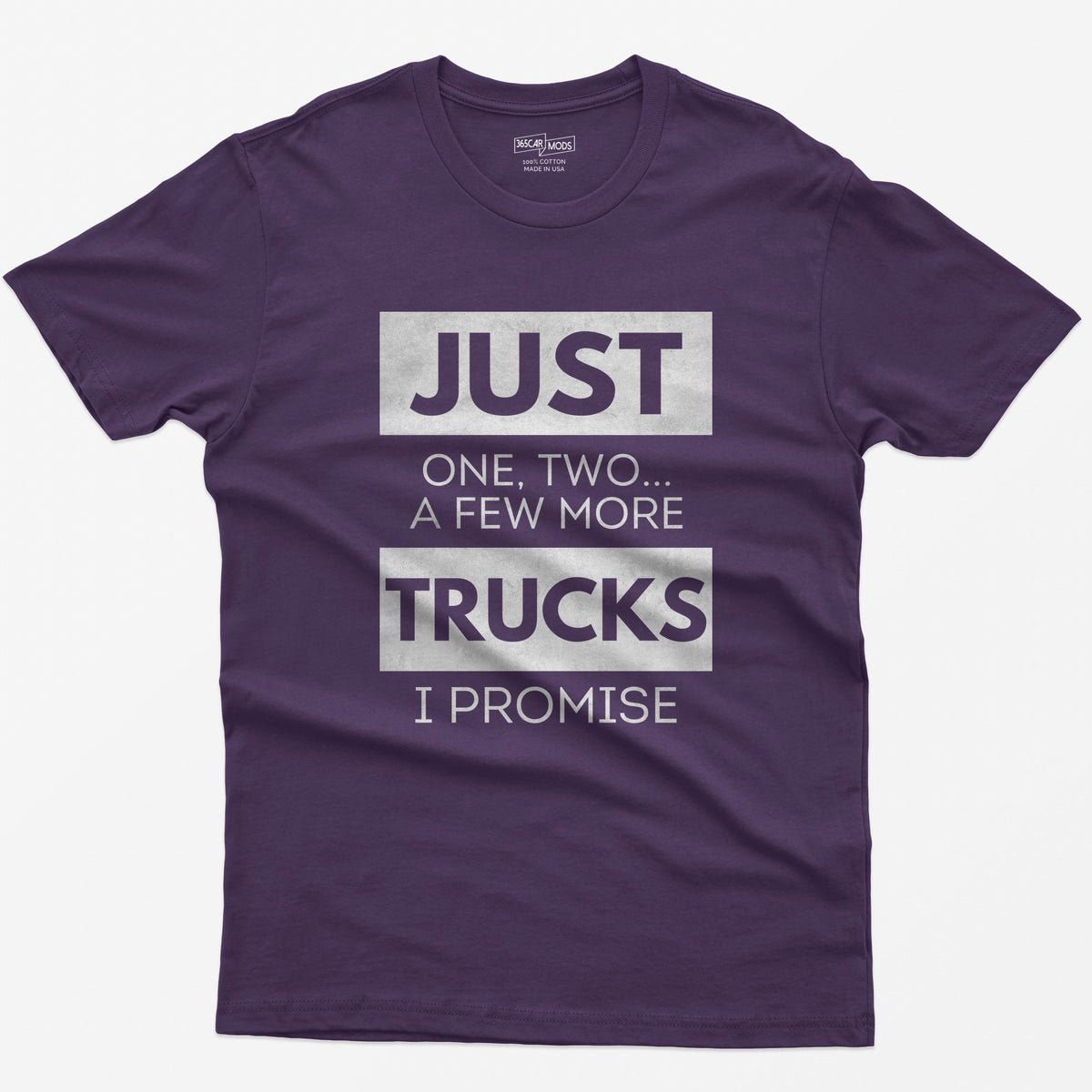 Purple t-shirt with Just One, Two, a Few More Trucks I Promise in bold stacked type on white blocks