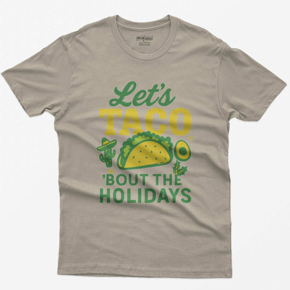 Sand t-shirt with Let's Taco Bout The Holidays in green and yellow, with a taco, a cactus in a sombrero, avocado and holly