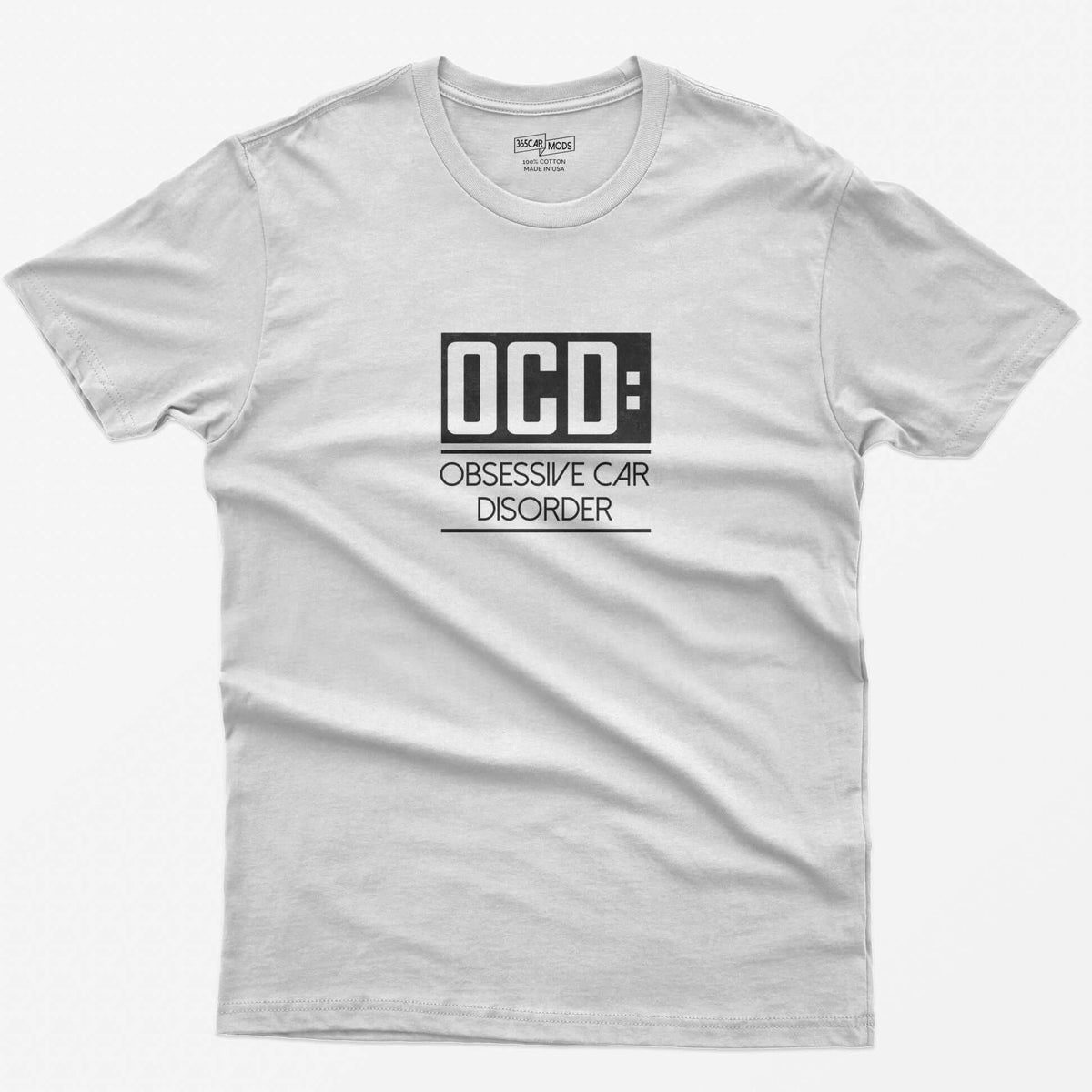 White t-shirt with small boxed OCD: Obsessive Car Disorder print on the chest