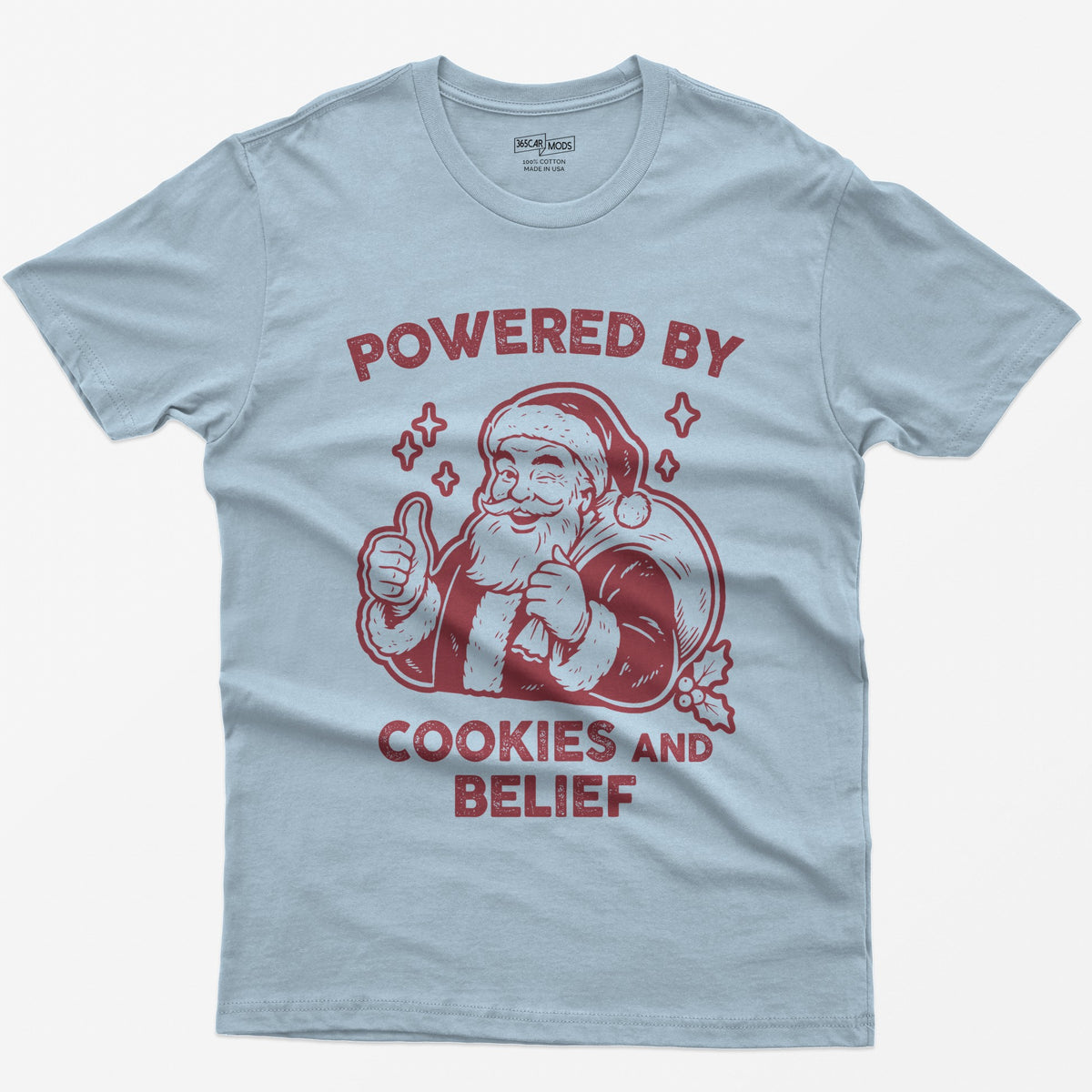 Light Blue t-shirt with vintage white print of a winking Santa giving a thumbs up and the words Powered by Cookies and Belief
