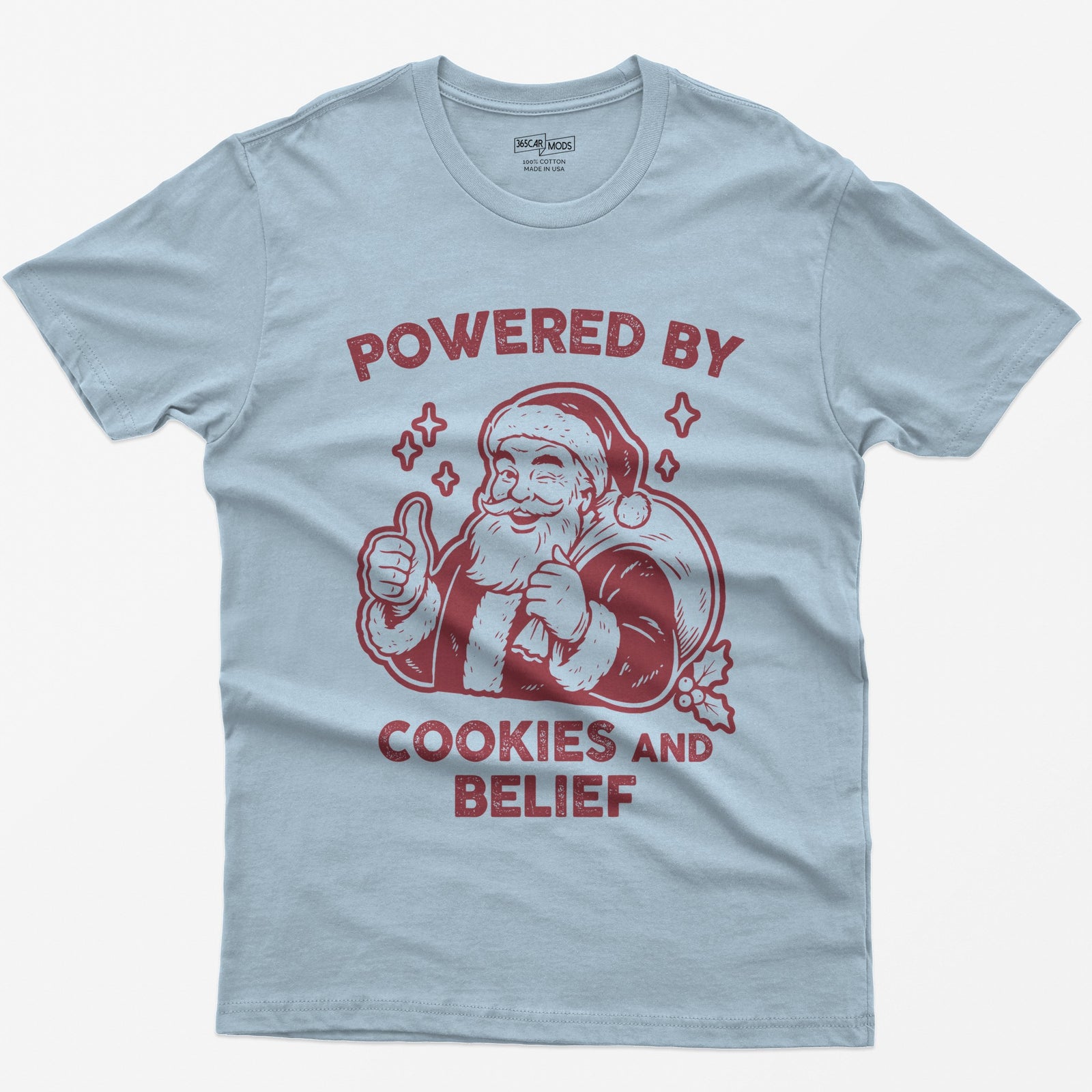 Light Blue t-shirt with vintage white print of a winking Santa giving a thumbs up and the words Powered by Cookies and Belief