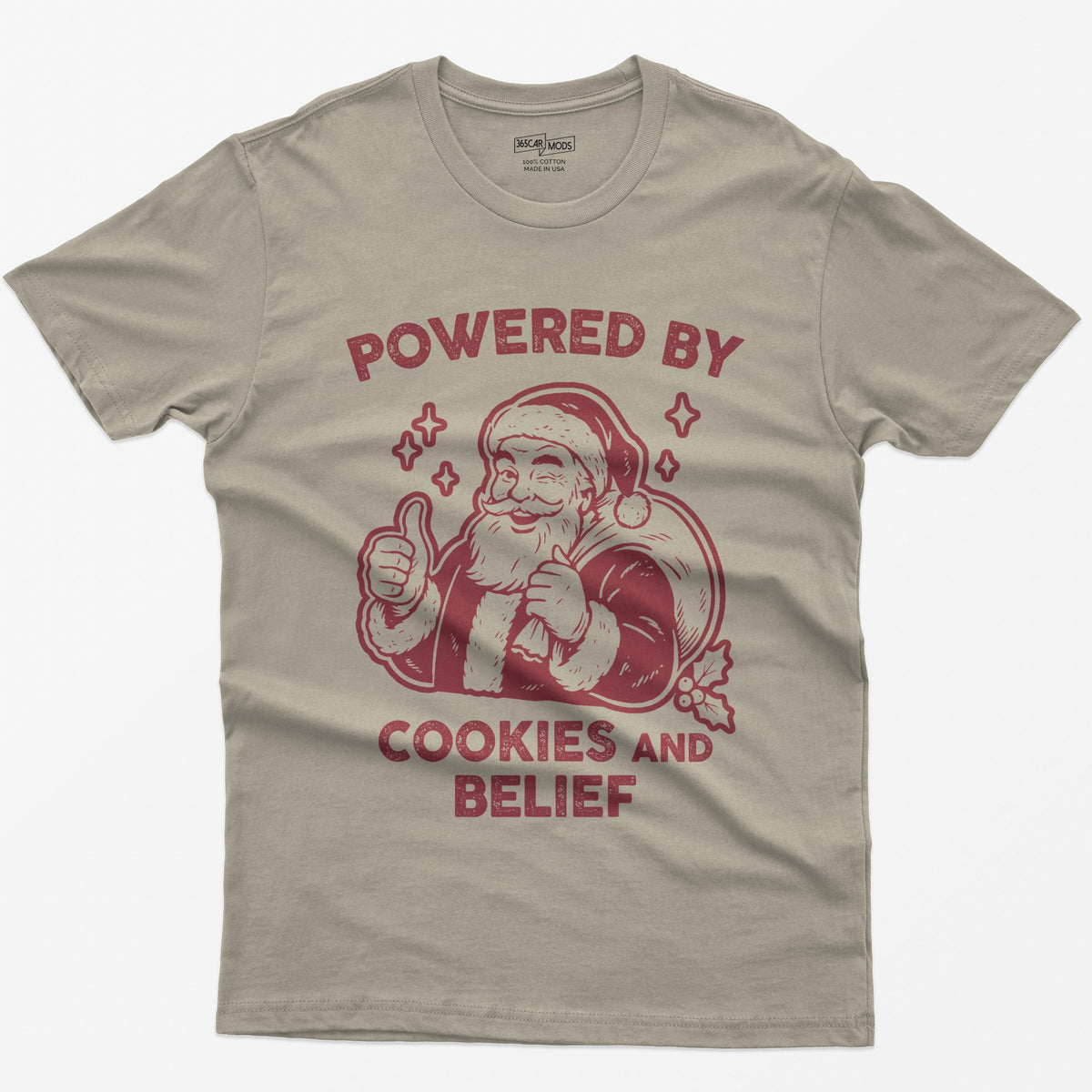 Sand t-shirt with vintage white print of a winking Santa giving a thumbs up and the words Powered by Cookies and Belief
