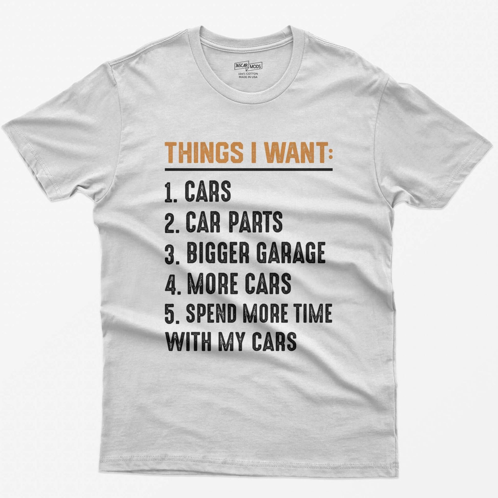 White t-shirt with orange Things I Want heading and numbered list: cars, car parts, bigger garage, more cars, time with cars
