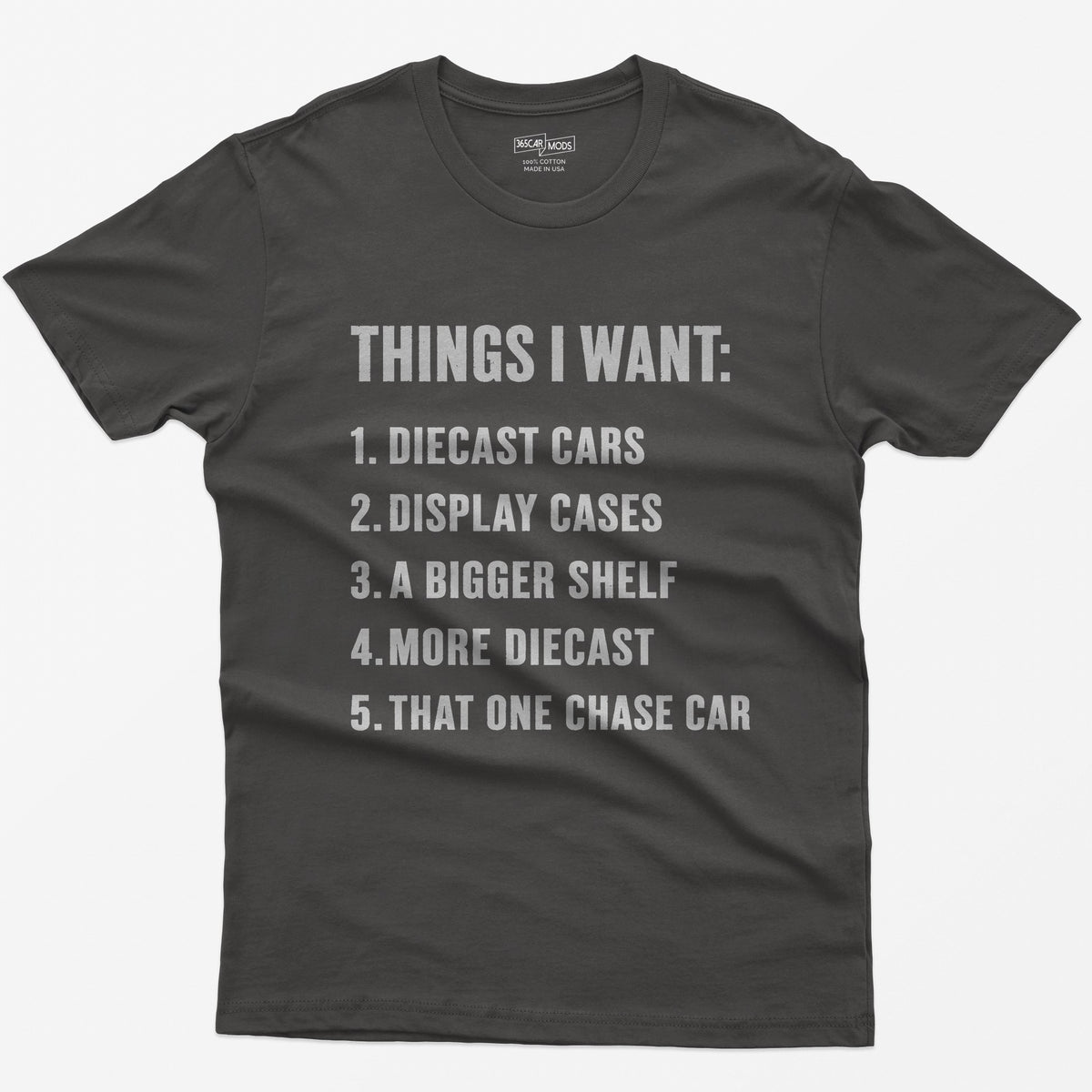 Dark Heather t-shirt with white block text Things I Want list: diecast cars, display cases, a bigger shelf, that one chase car